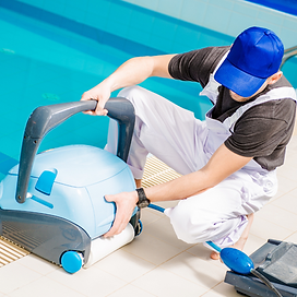 Technician doing salt water pool maintenance